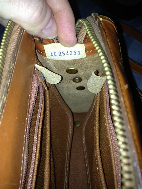 how to spot a fake dooney bag|dooney and bourke handbags false.